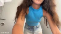 Katty West - Risky piss in locker room clothes store