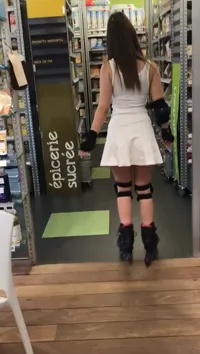 Stella Cox - Roller skating in a supermarket